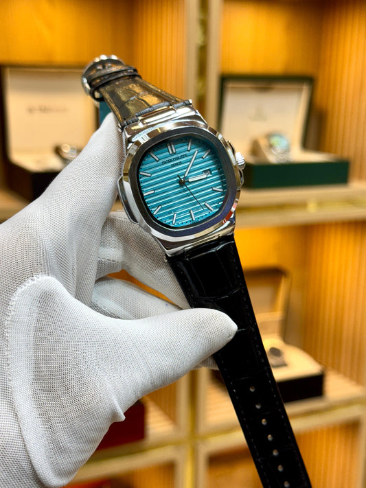 PATEK PHILIPPE LEATHER STRAP WATCH