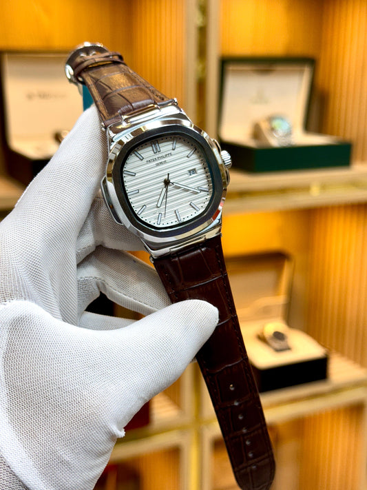 PATEK PHILIPPE LEATHER STRAP WATCH